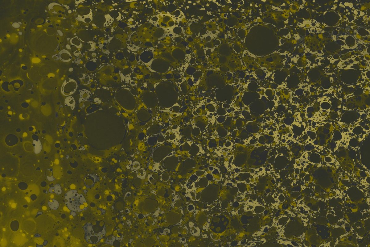 Artistic abstract pattern resembling marbling, creating a creative and textured background.